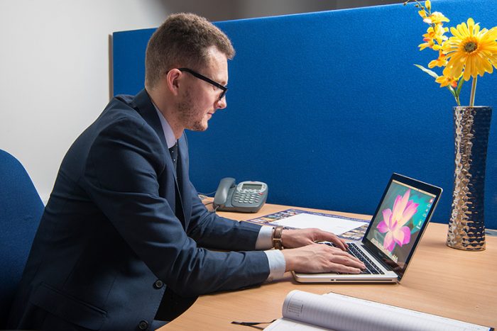 Image of man working at desk