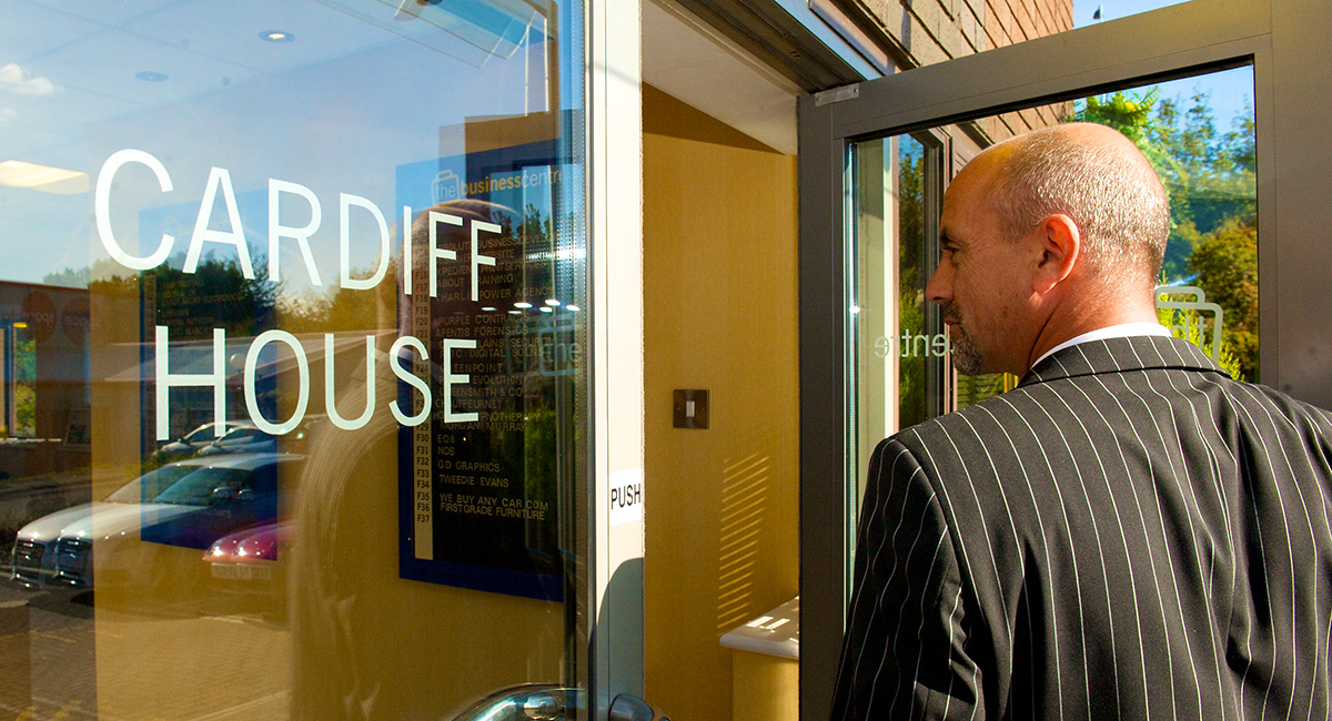 Image of man entering Cardiff House.